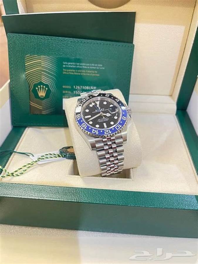 GMT-style watch beside branded packaging for a super clone identification guide