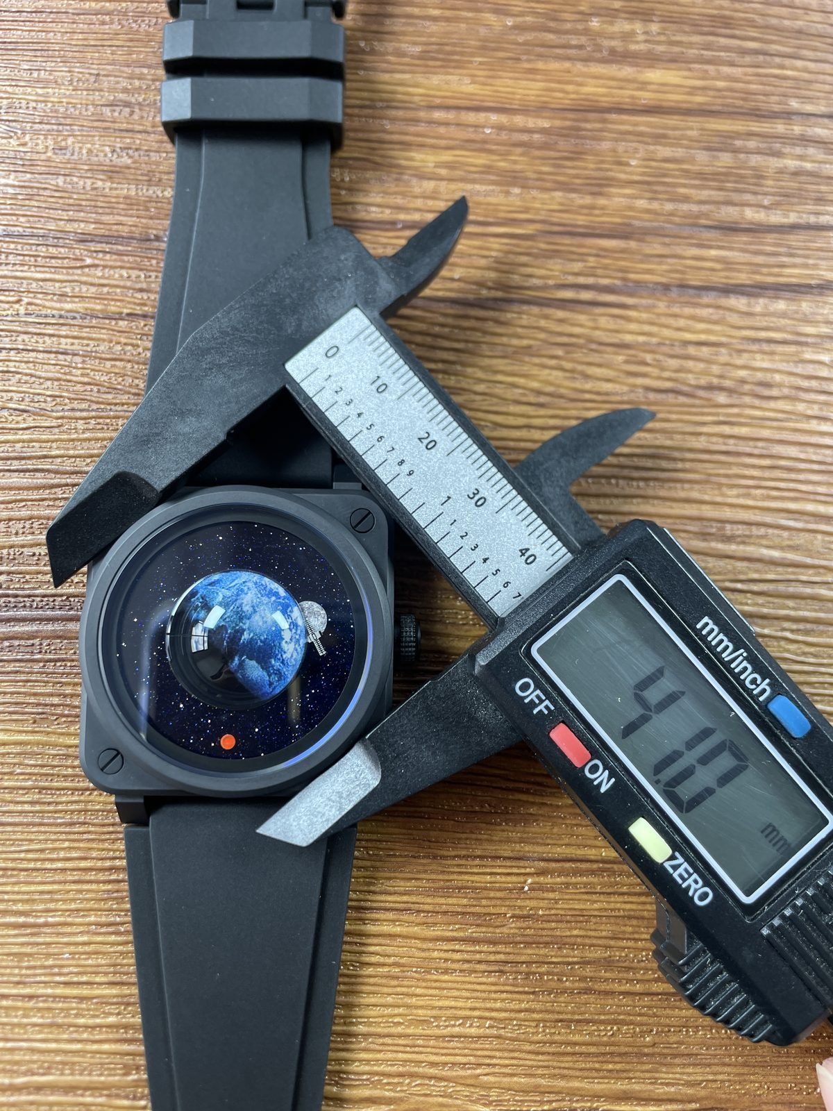 Bell and Ross BR-03 Astro replica second front calliper view with approximately 44.8 millimetre display partly obscured