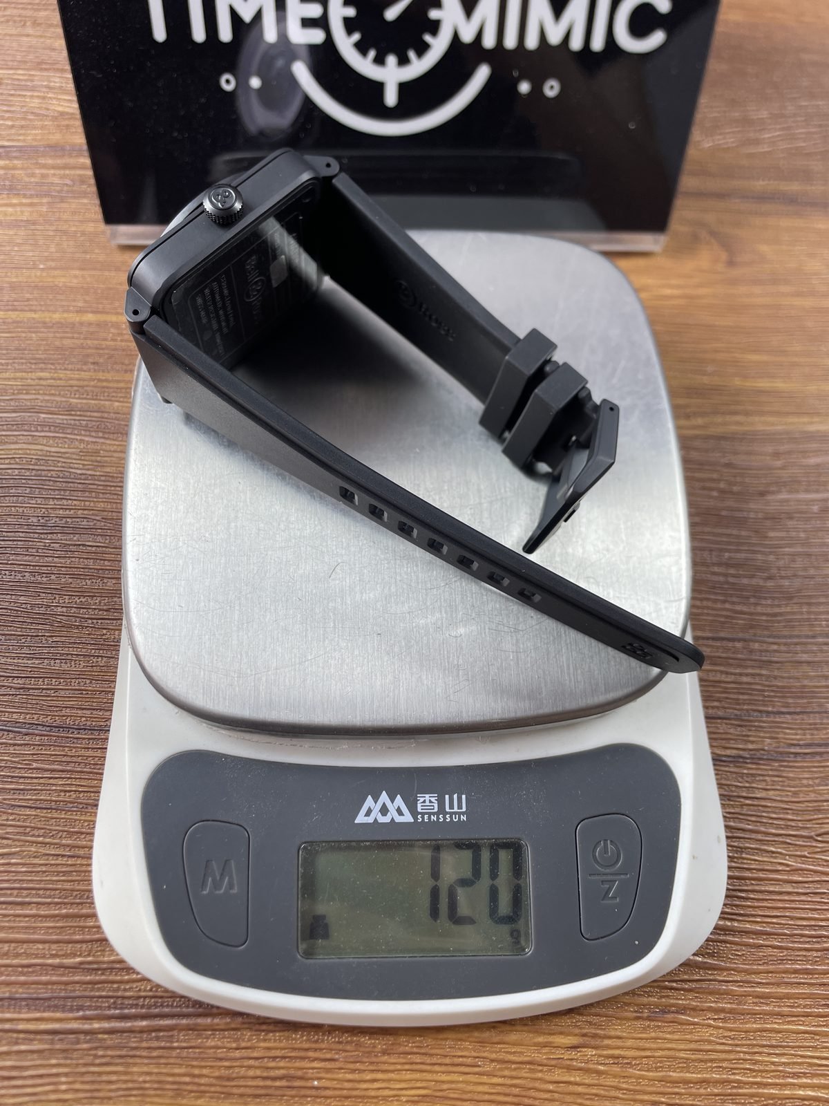 Bell and Ross BR-03 Astro replica pictured consumer scale reading 120 grams with molded strap