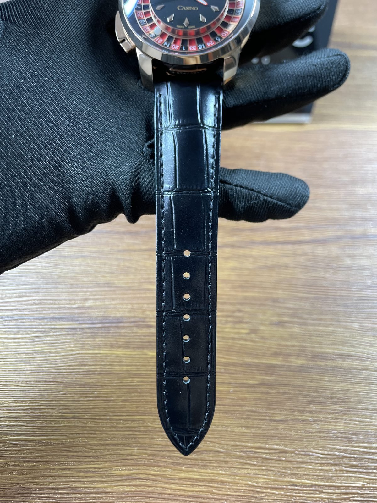 Jacob and Co Casino Tourbillon custom replica fitted black glossy crocodile pattern strap holes and stitching