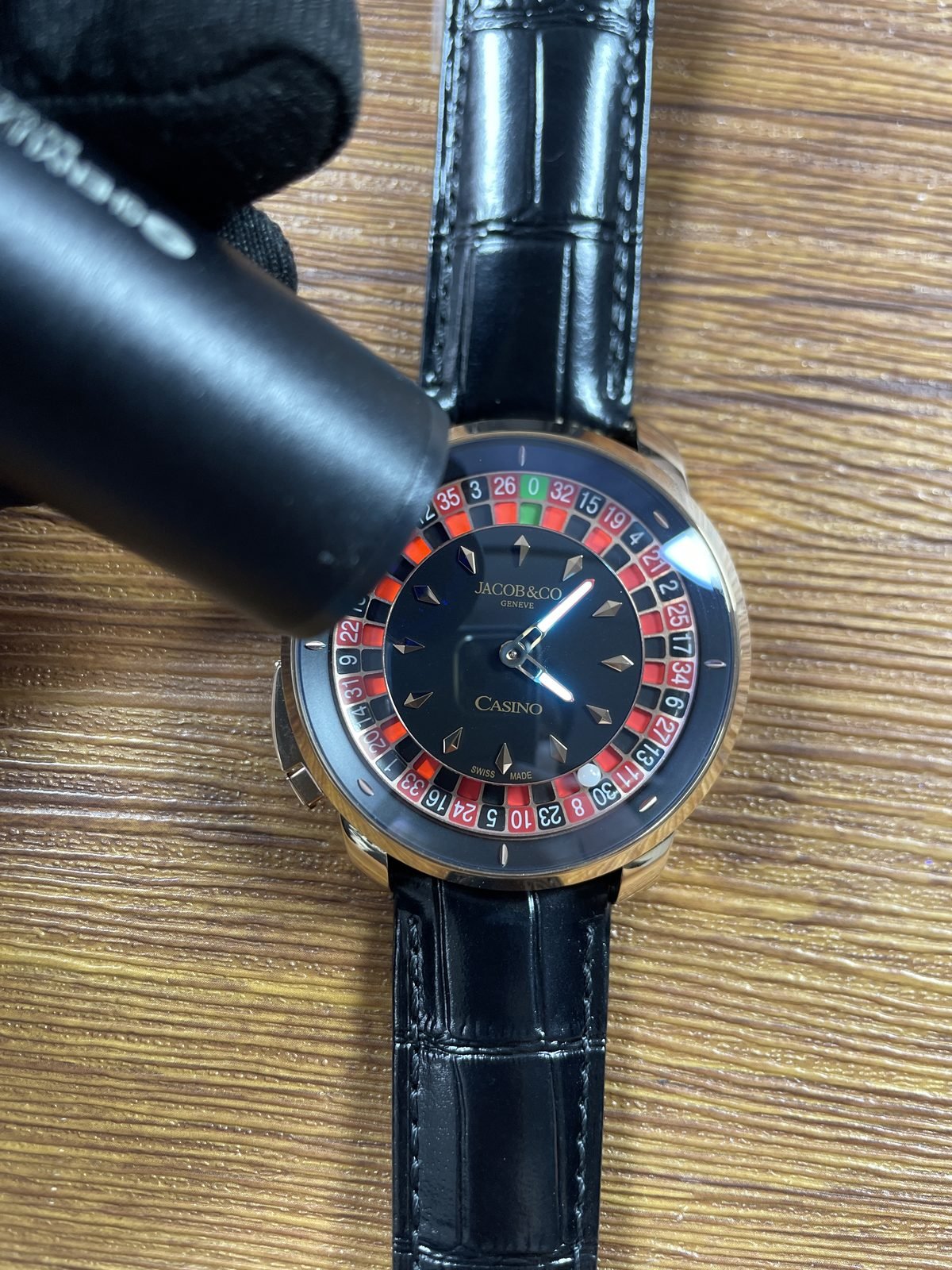 Jacob and Co Casino Tourbillon custom replica dial under blue violet light with bright hand response