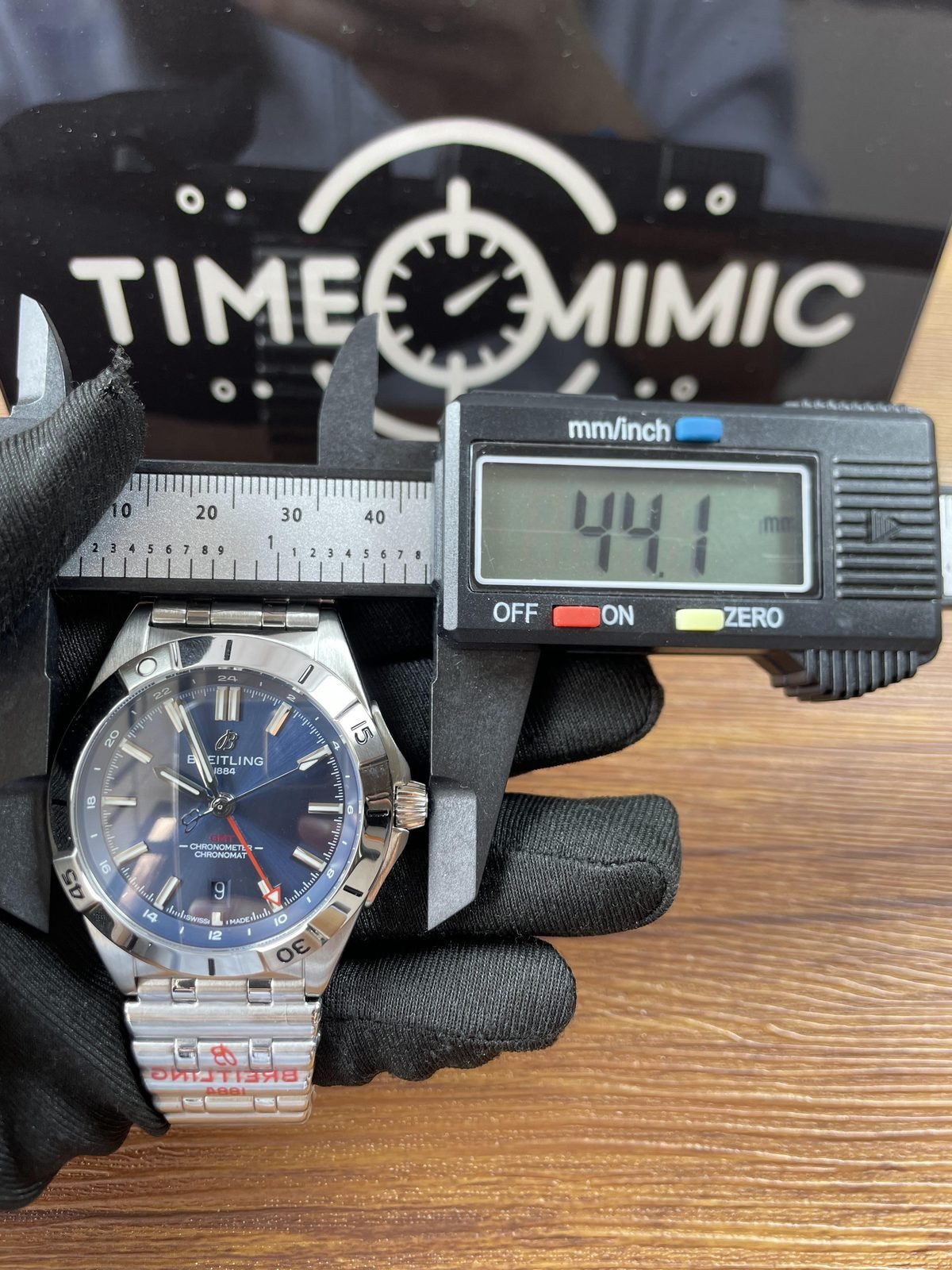 Breitling Chronomat A32398101C1A1 replica pictured front calliper placement reading 44.1 millimetres across crown area