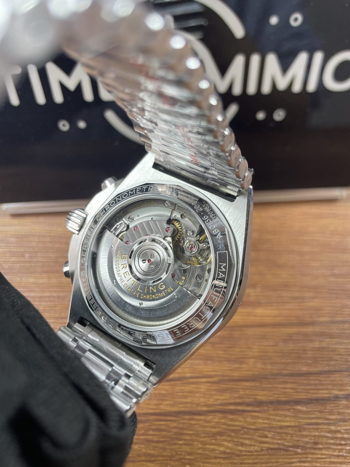 Breitling Chronomat AB0134101C1A1 replica exhibition back decorated rotor movement appearance and reference-style inscriptions