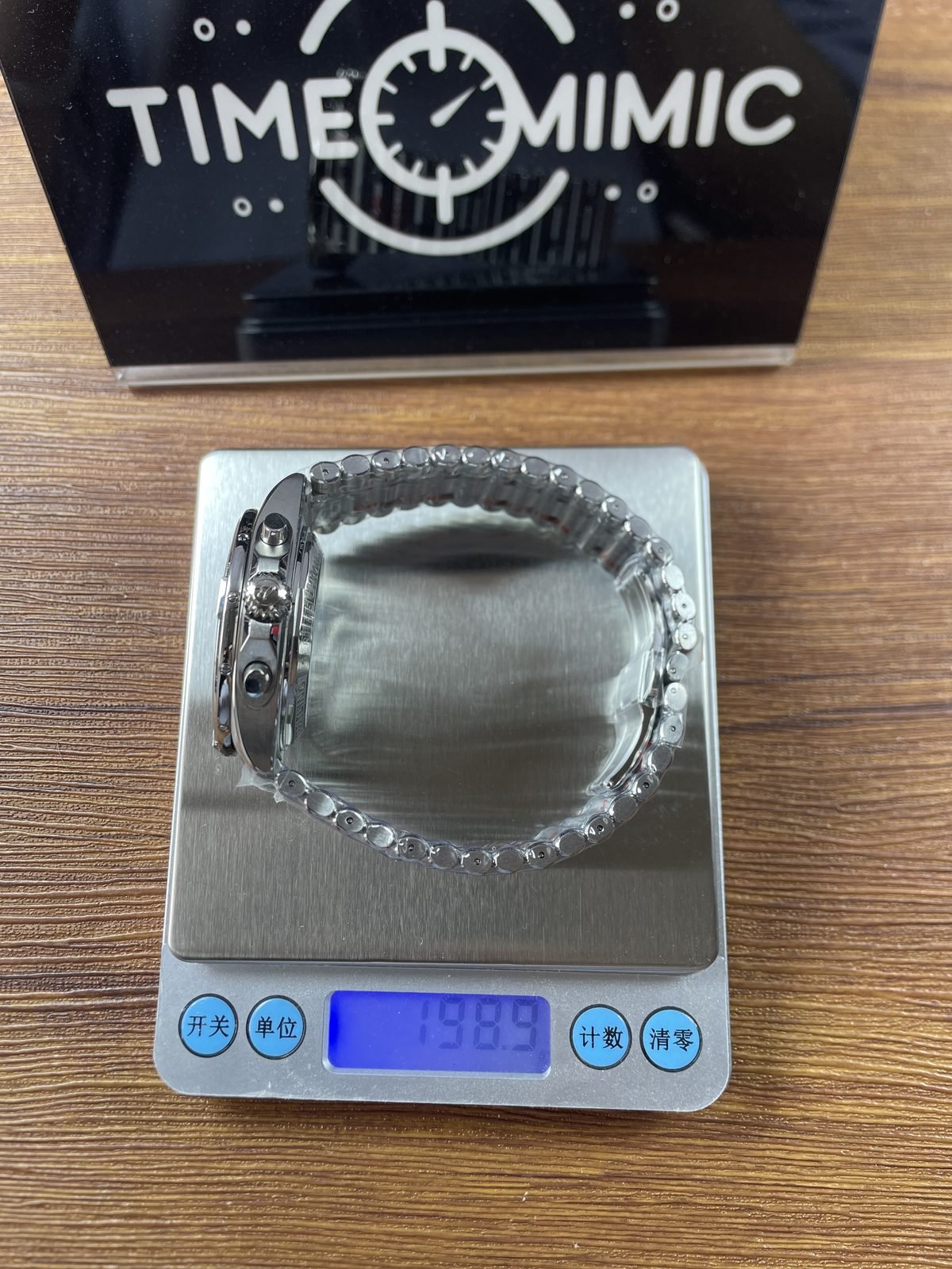 Breitling Chronomat AB0134101C1A1 replica pictured consumer scale reading 198.9 grams