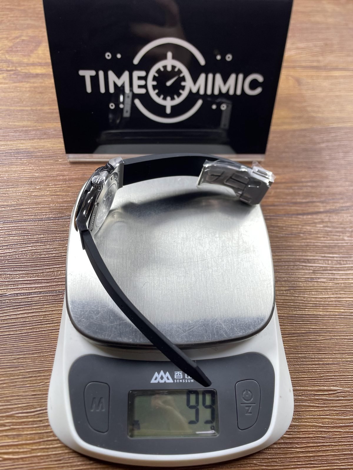 Hublot Classic Fusion 565 NX 7071 RX replica pictured scale reading about 99 grams