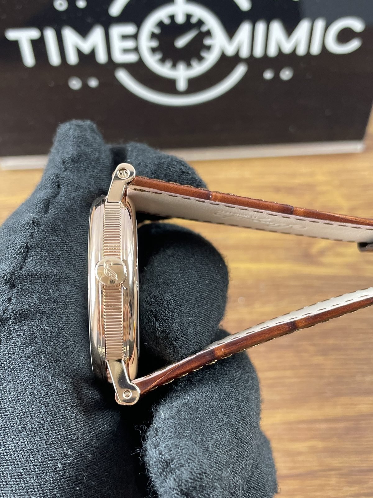 Breguet Classique 5177BA replica silver guilloche-style centre date at three and coin-edge caseband angled view
