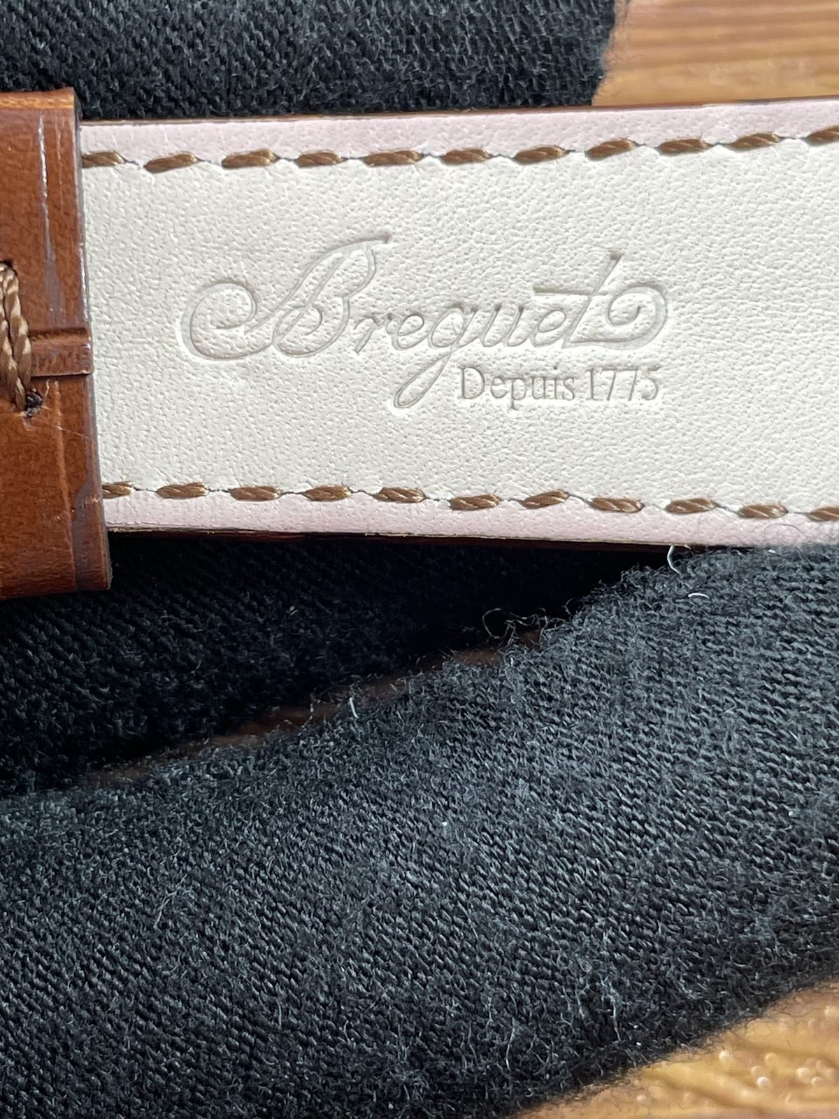 Breguet Classique 5177BA replica second strap underside view with Breguet Depuis 1775-style embossing