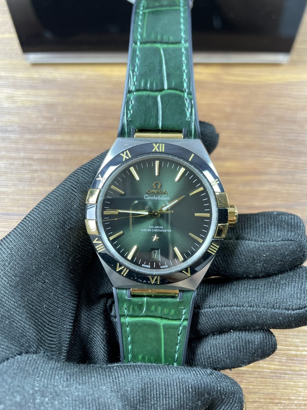Omega Constellation 131.23.41.21.10.001 replica green gradient dial black Roman numeral bezel front