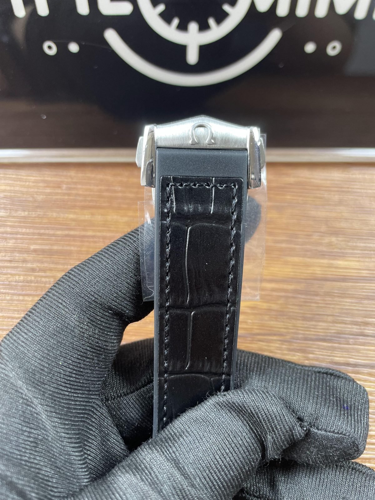 Omega Constellation replica black crocodile pattern strap exterior stitching and logo attachment