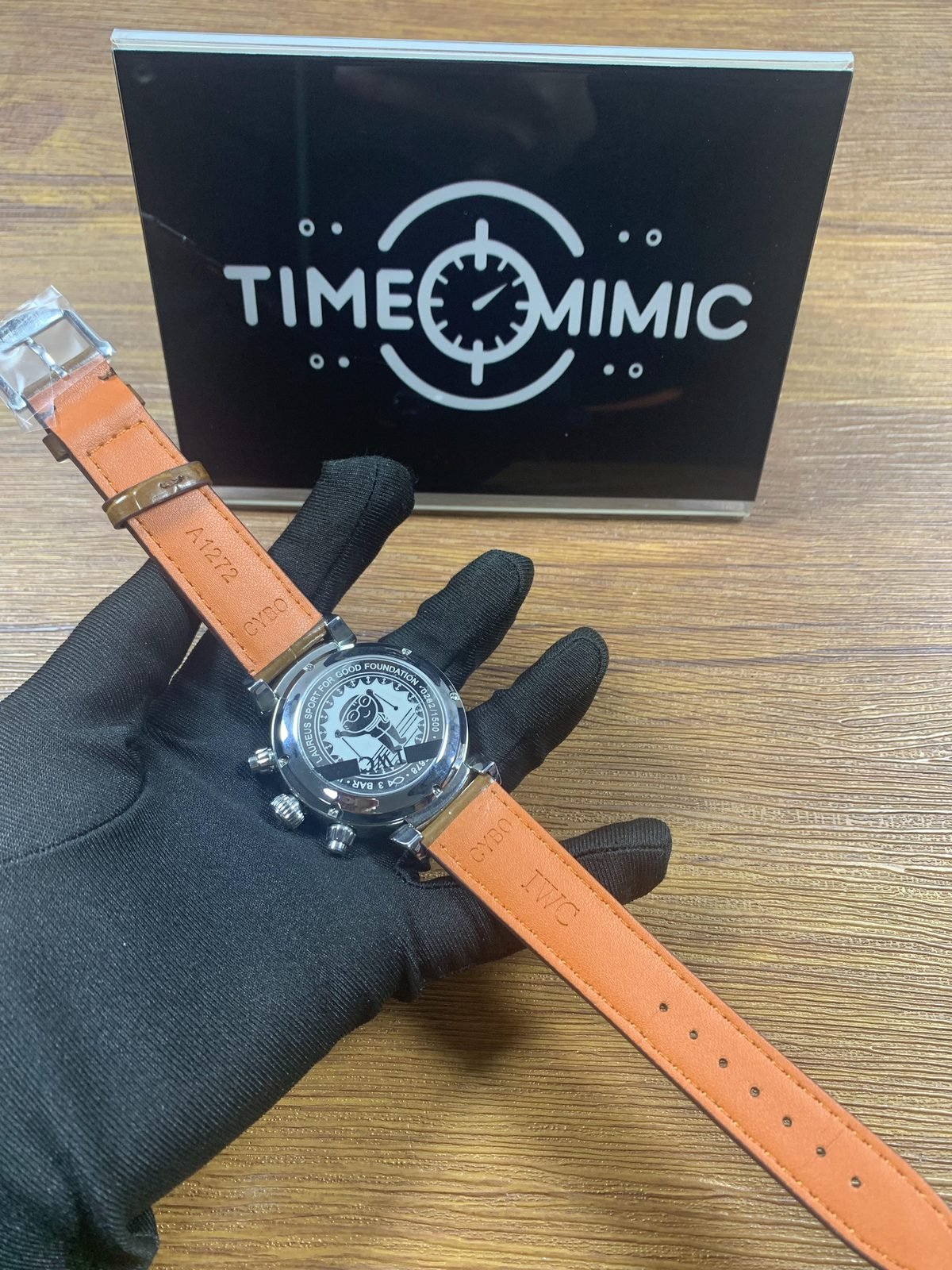 IWC Da Vinci IW393402 replica Laureus 2017 style engraved solid caseback brown strap underside