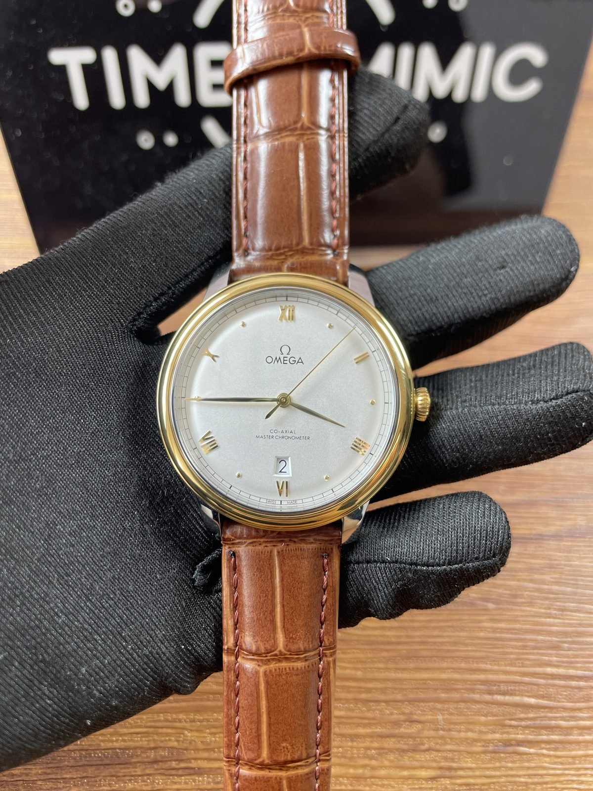 Omega De Ville 434.23.40.20.02.002 replica silvery dial warm yellow tone bezel brown crocodile pattern strap front
