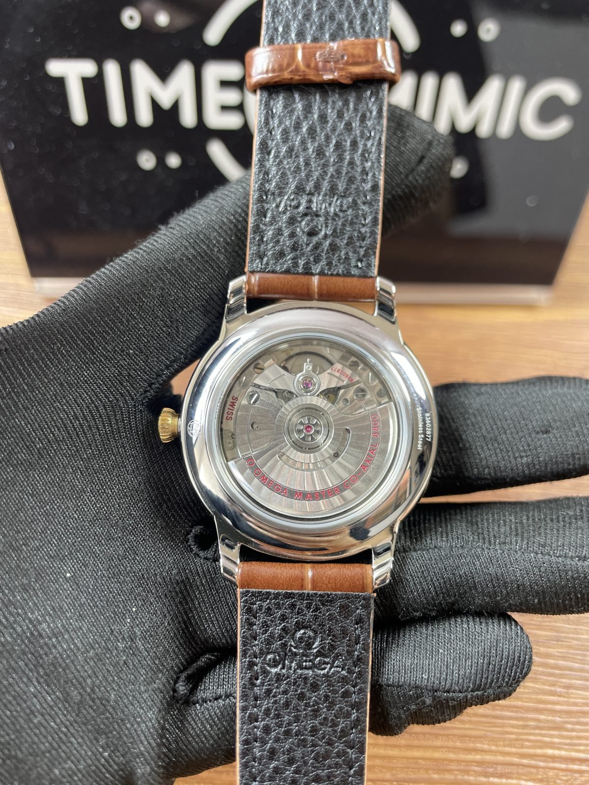 Omega De Ville replica transparent back automatic movement appearance full rotor red 8800 style lettering