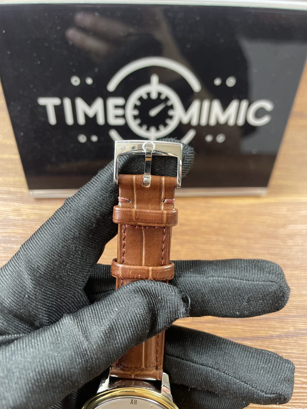 Omega De Ville replica brown crocodile pattern strap and pin buckle exterior logo