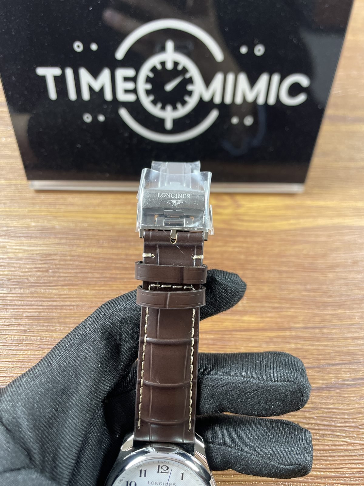Longines Master Collection L2 909 4 78 3 replica brown embossed pale stitch strap and folding clasp under film