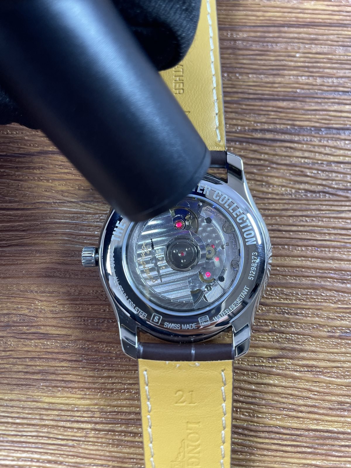 Longines Master Collection L2 909 4 78 3 replica coloured light reflections through transparent back not a crystal test