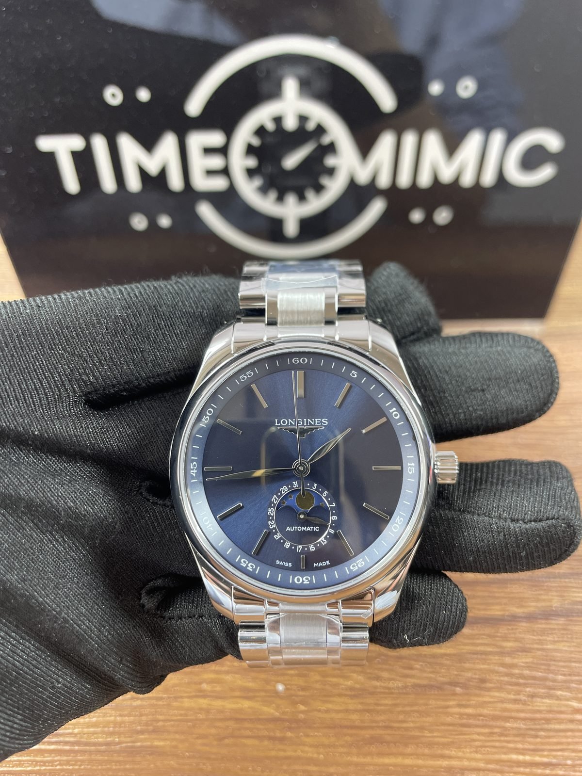 Longines Master Collection L2 909 4 92 6 replica blue radial dial baton markers moonphase pointer date steel colour bracelet