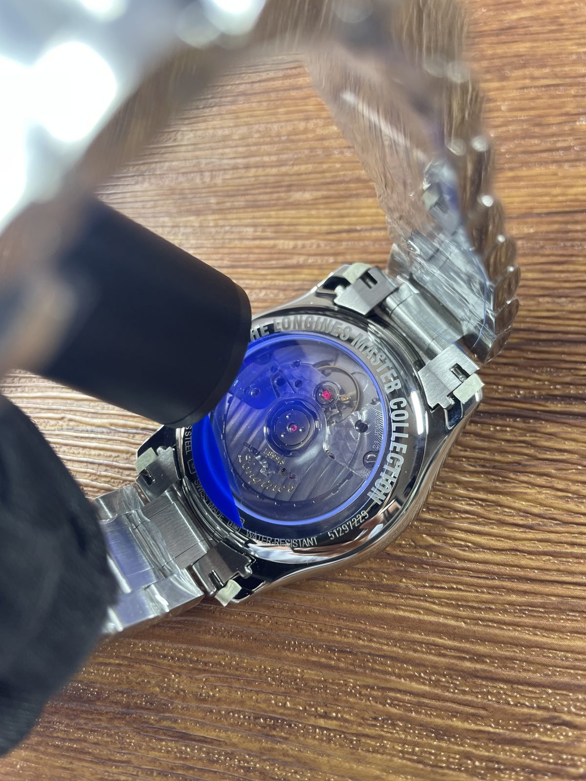 Longines Master Collection L2 909 4 92 6 replica coloured light reflections through transparent back not a crystal test