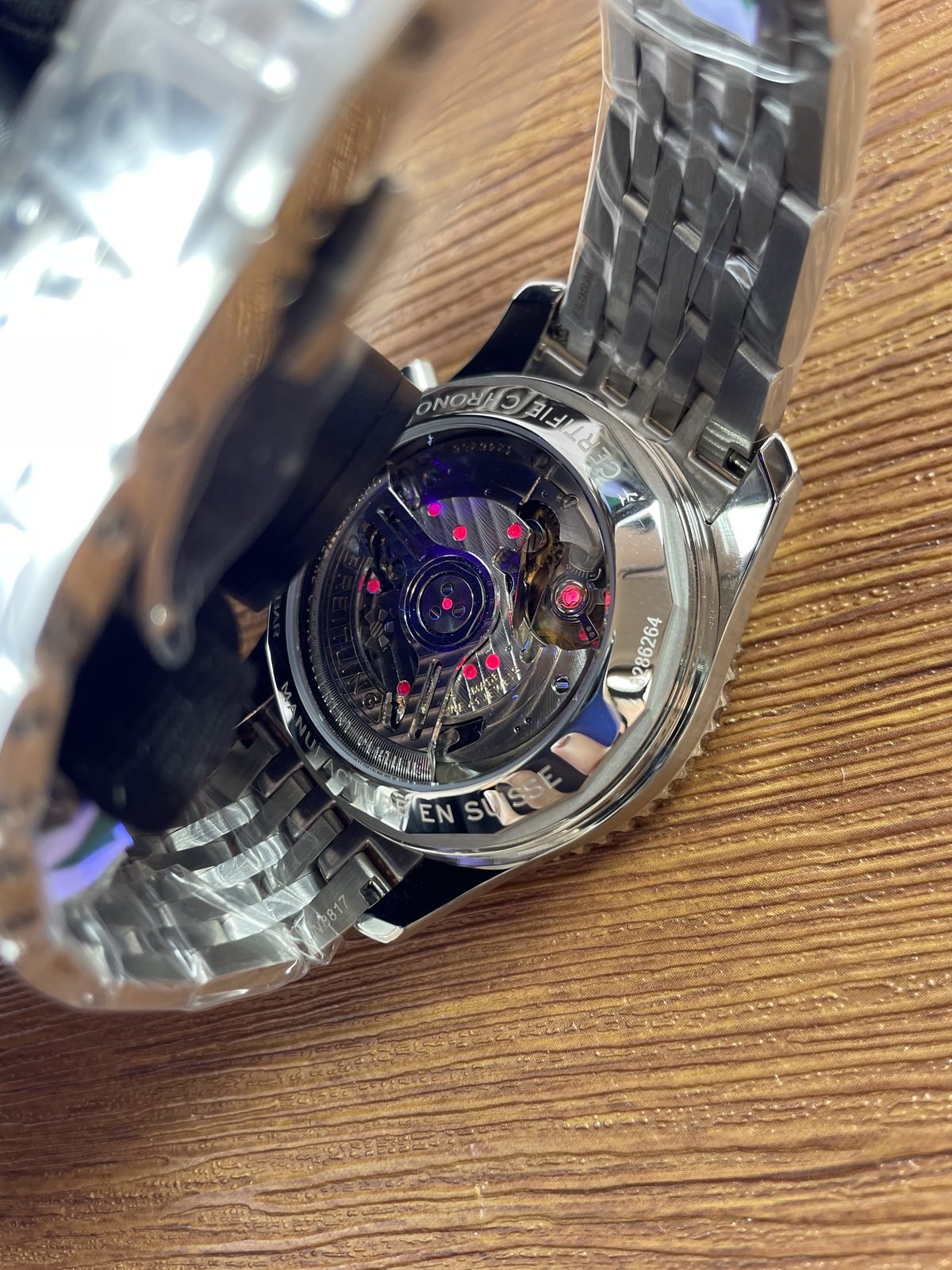 Breitling Navitimer AB0138211B1A1 replica exhibition back decorated movement appearance 286264 and M-8317 style markings