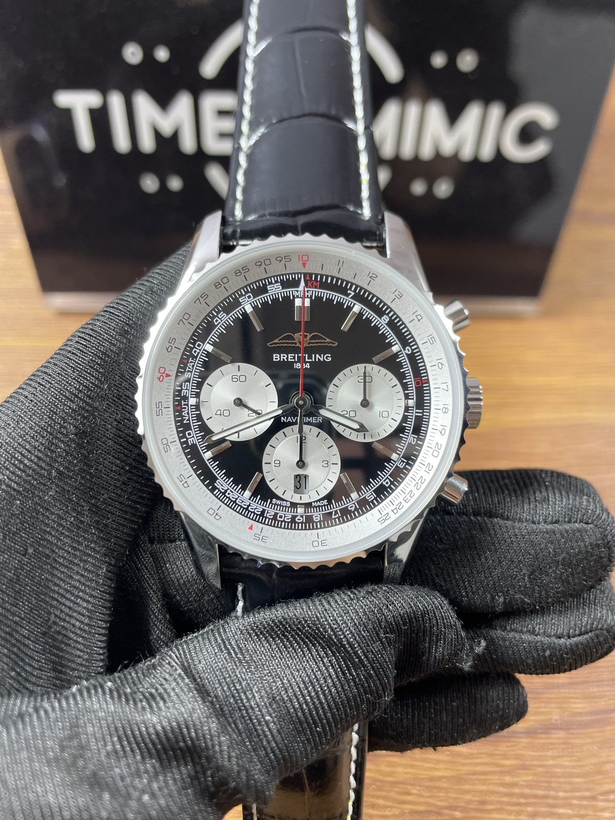 Breitling Navitimer AB0138211B1P1 replica black reverse-panda dial black embossed white-stitched strap front