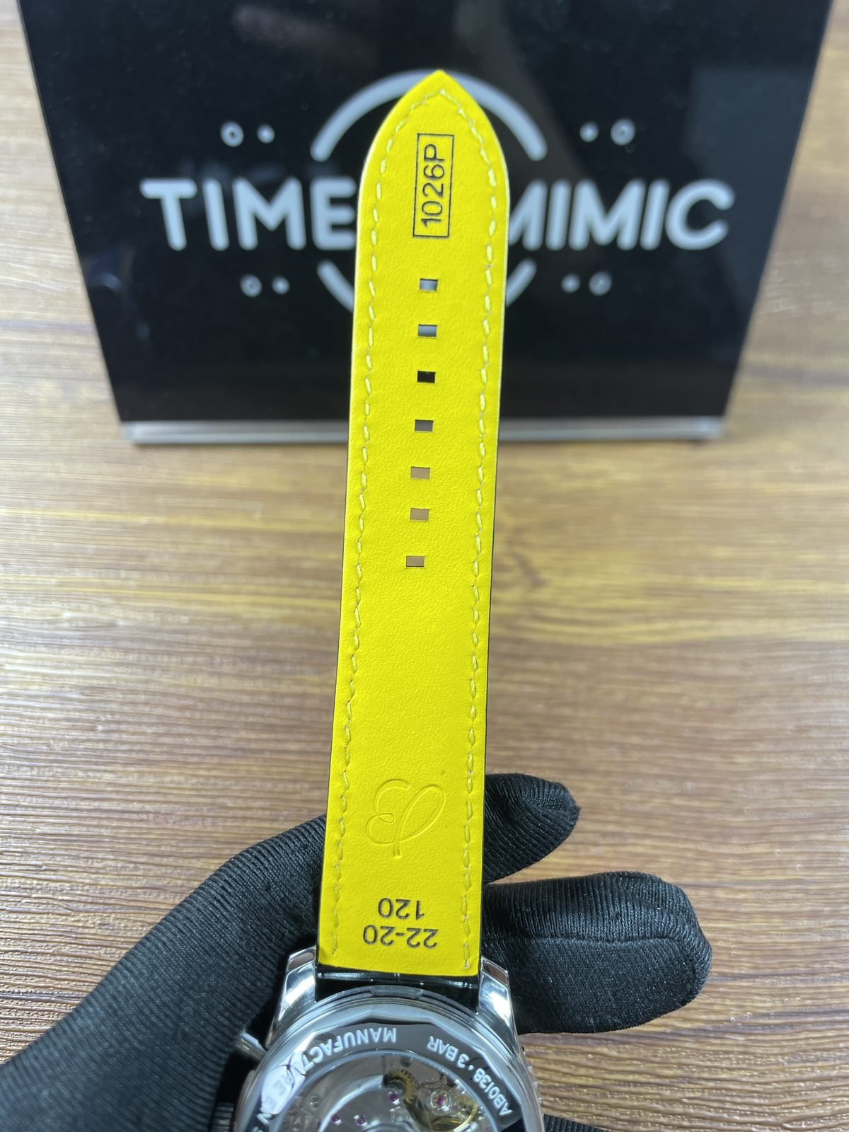 Breitling Navitimer AB0138211B1P1 replica bright yellow strap lining with 22-20 120 and 1026P style markings
