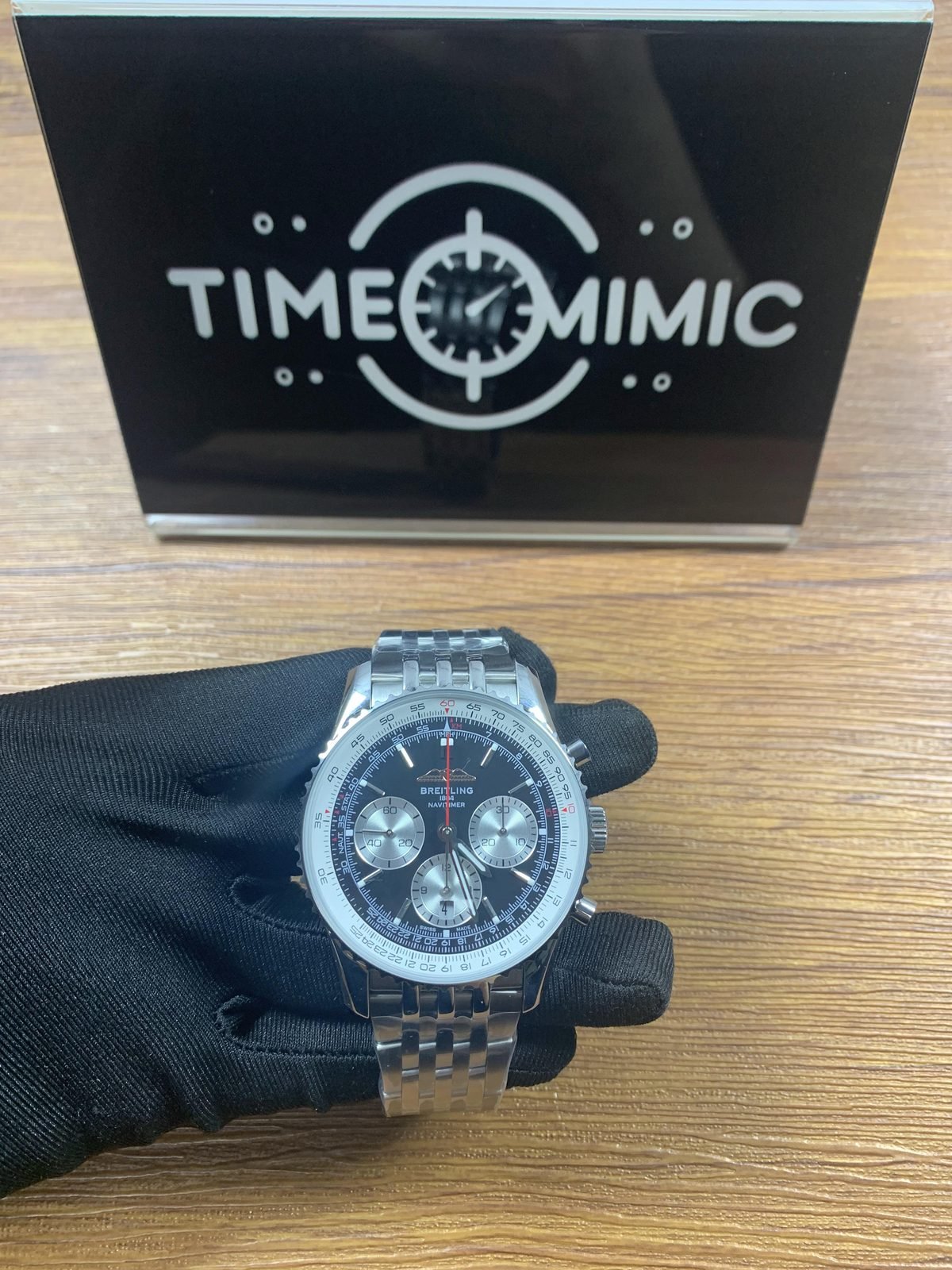 Breitling Navitimer AB0139211B1P1 listing sample black reverse-panda dial silver multi-row bracelet front