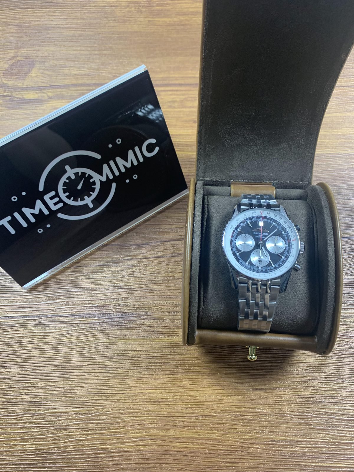 Breitling Navitimer AB0139211B1P1 listing sample black reverse-panda watch inside brown roll-style box
