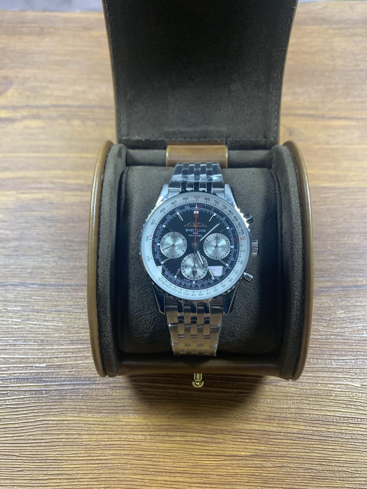Breitling Navitimer AB0139211B1P1 listing sample close front view inside brown roll-style box