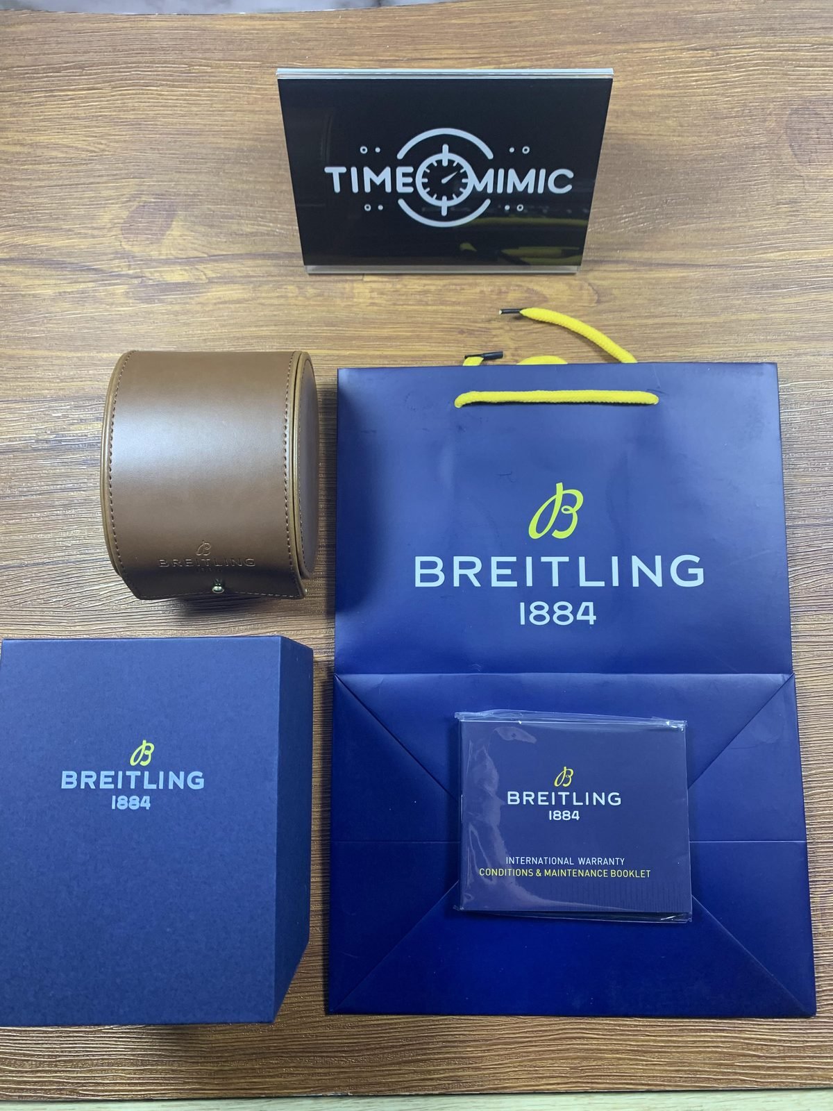 Breitling Navitimer AB0139211B1P1 listing sample watch box bag outer box and booklet style props full layout