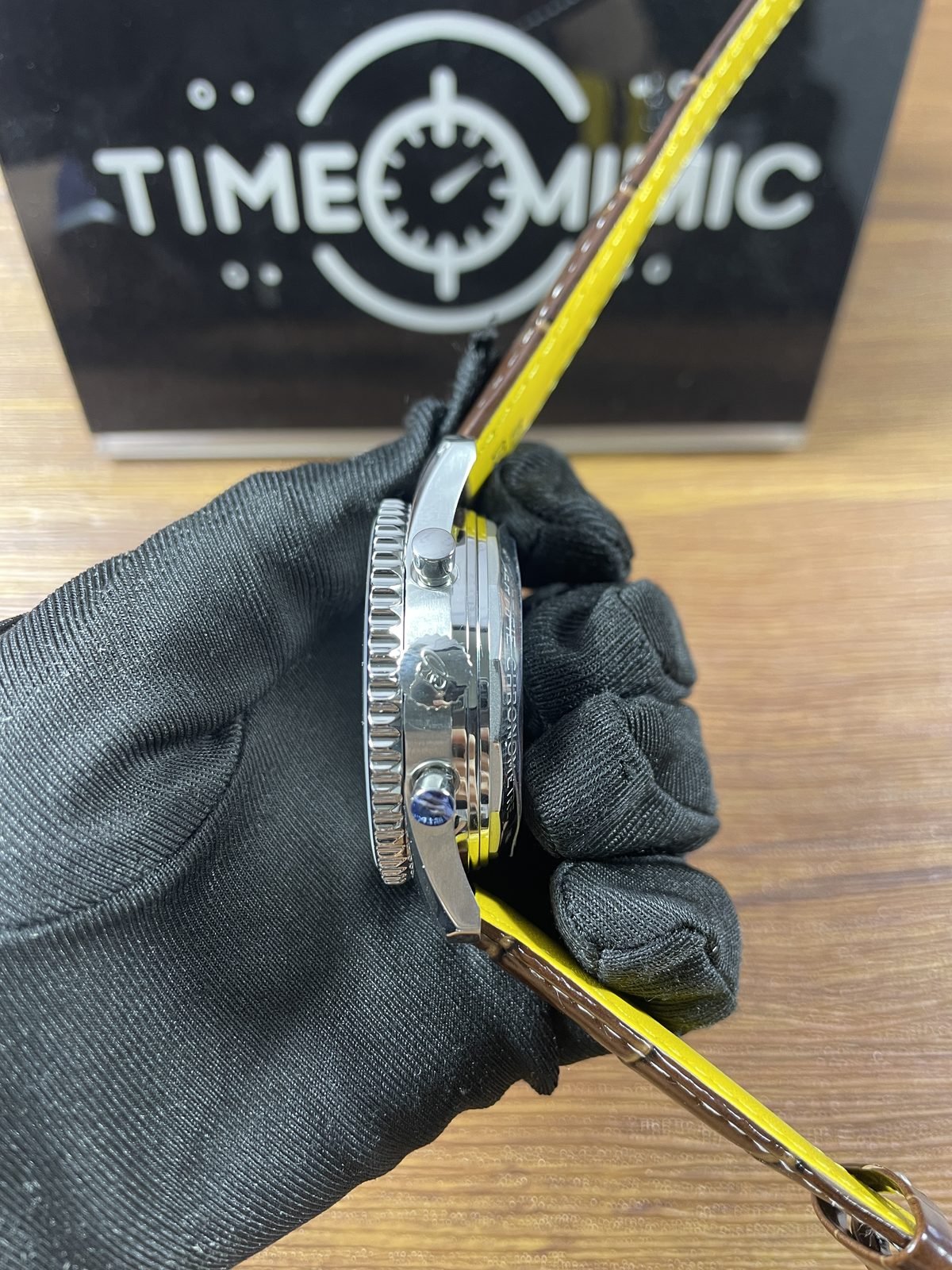 Breitling Navitimer AB0139211G1P1 replica coin-edge bezel crown two pushers brown strap yellow lining side
