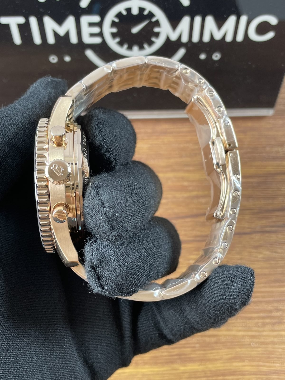 Breitling Navitimer RB0137241L1R1 replica coin edge bezel crown pushers warm tone multi row bracelet side