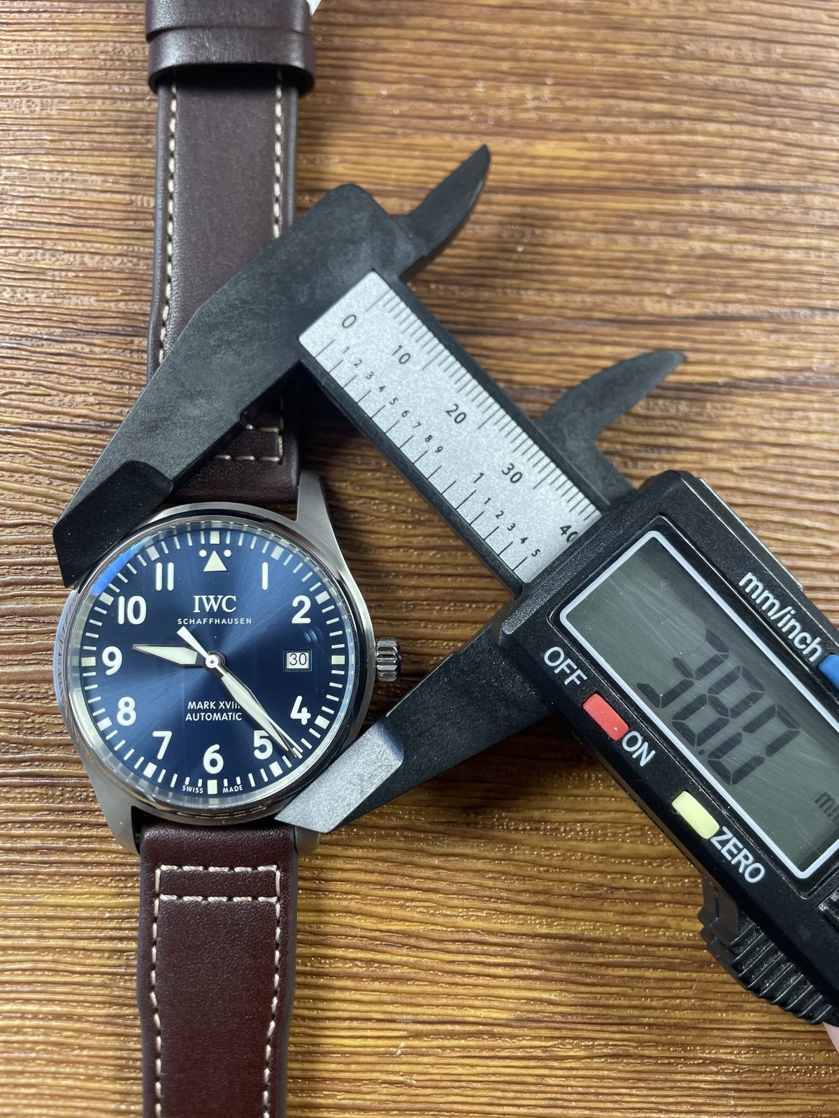 IWC Pilot IW327004 replica pictured maximum span appearing about 43 millimetres including crown