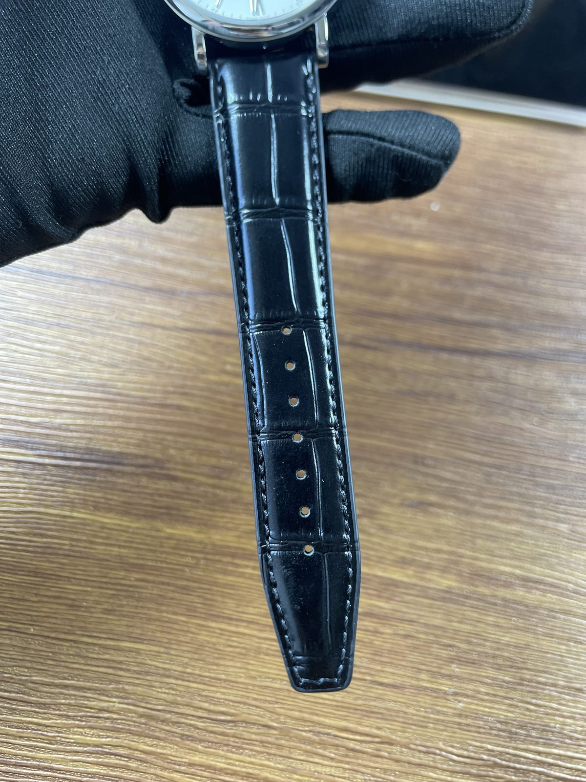 IWC Portofino IW356501 replica black glossy crocodile pattern strap holes and stitching