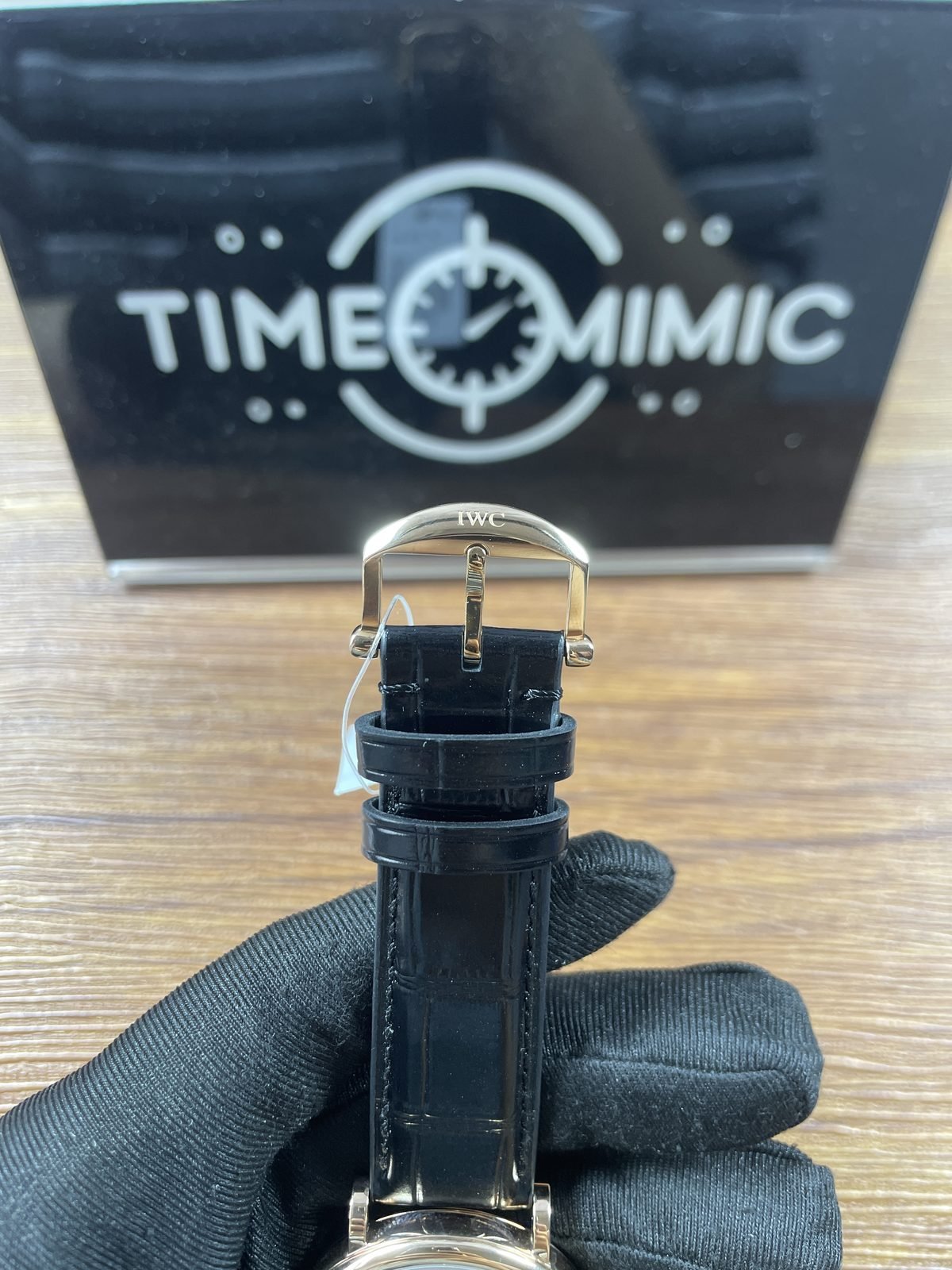 IWC Portofino IW356523 replica warm gold tone tang buckle and black glossy crocodile pattern strap