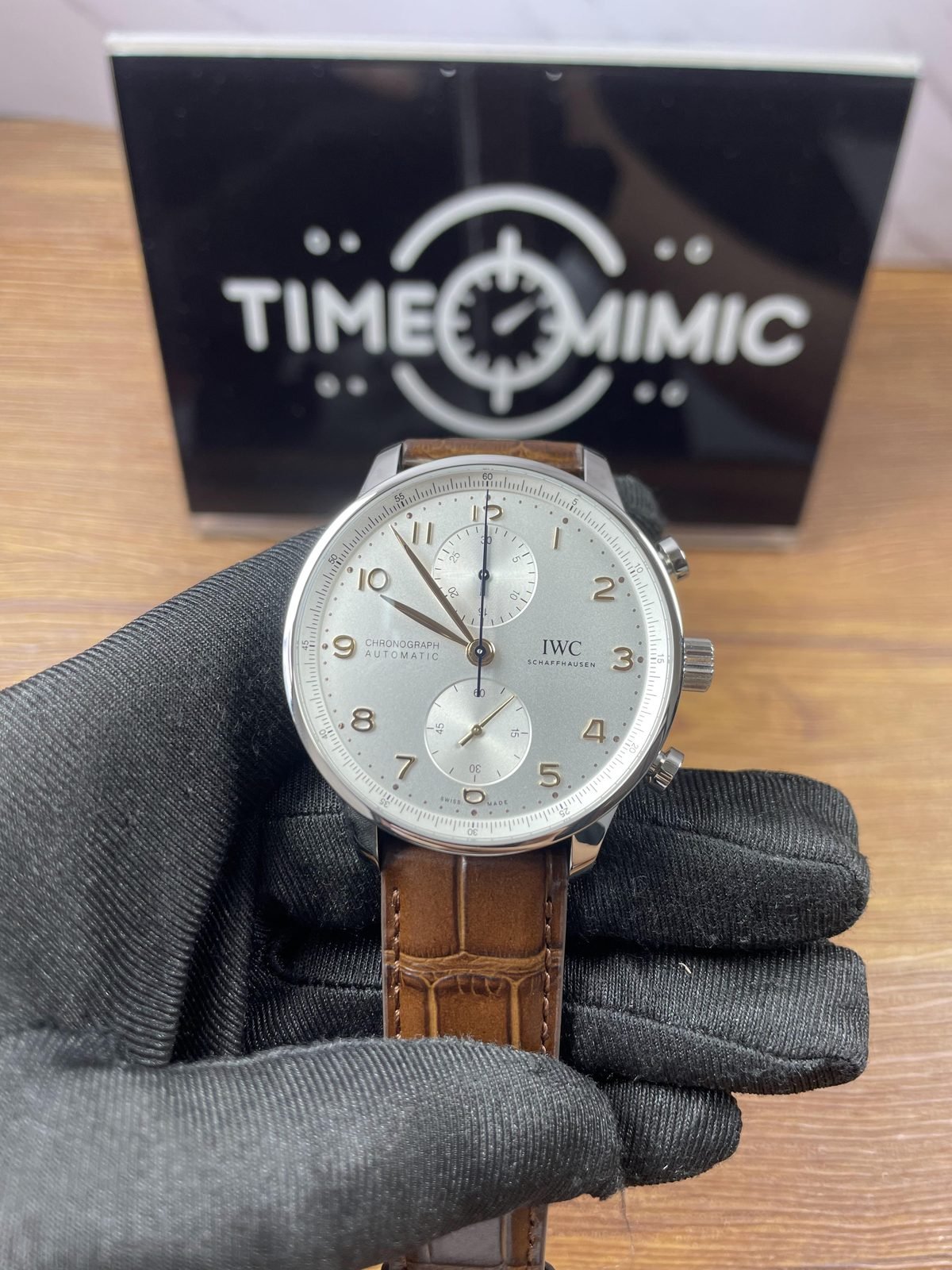 IWC Portugieser IW371445 replica silver white vertical register chronograph style dial steel colour case brown strap front