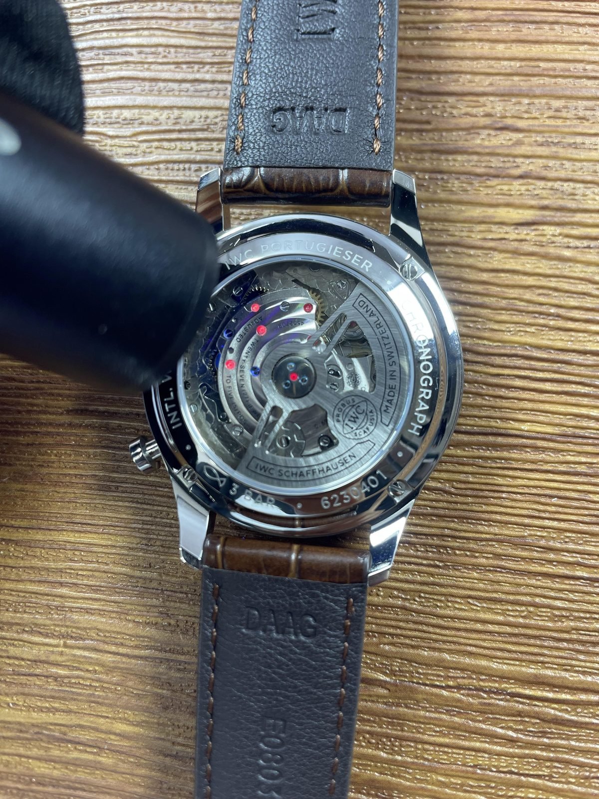 IWC Portugieser IW371445 replica exhibition back under blue violet inspection light