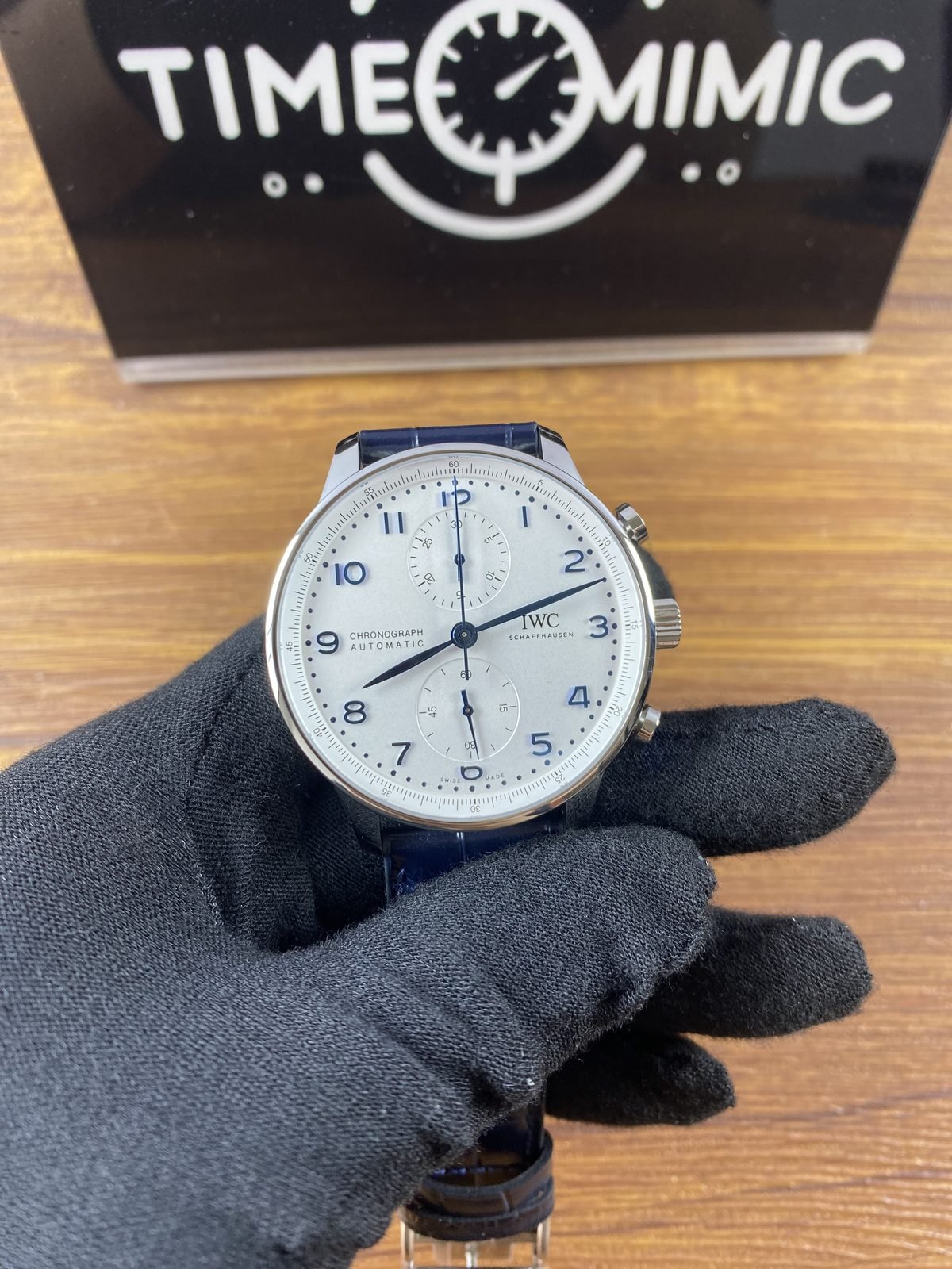 IWC Portugieser IW371446 replica silver white dial blue numerals hands steel colour case dark blue strap front
