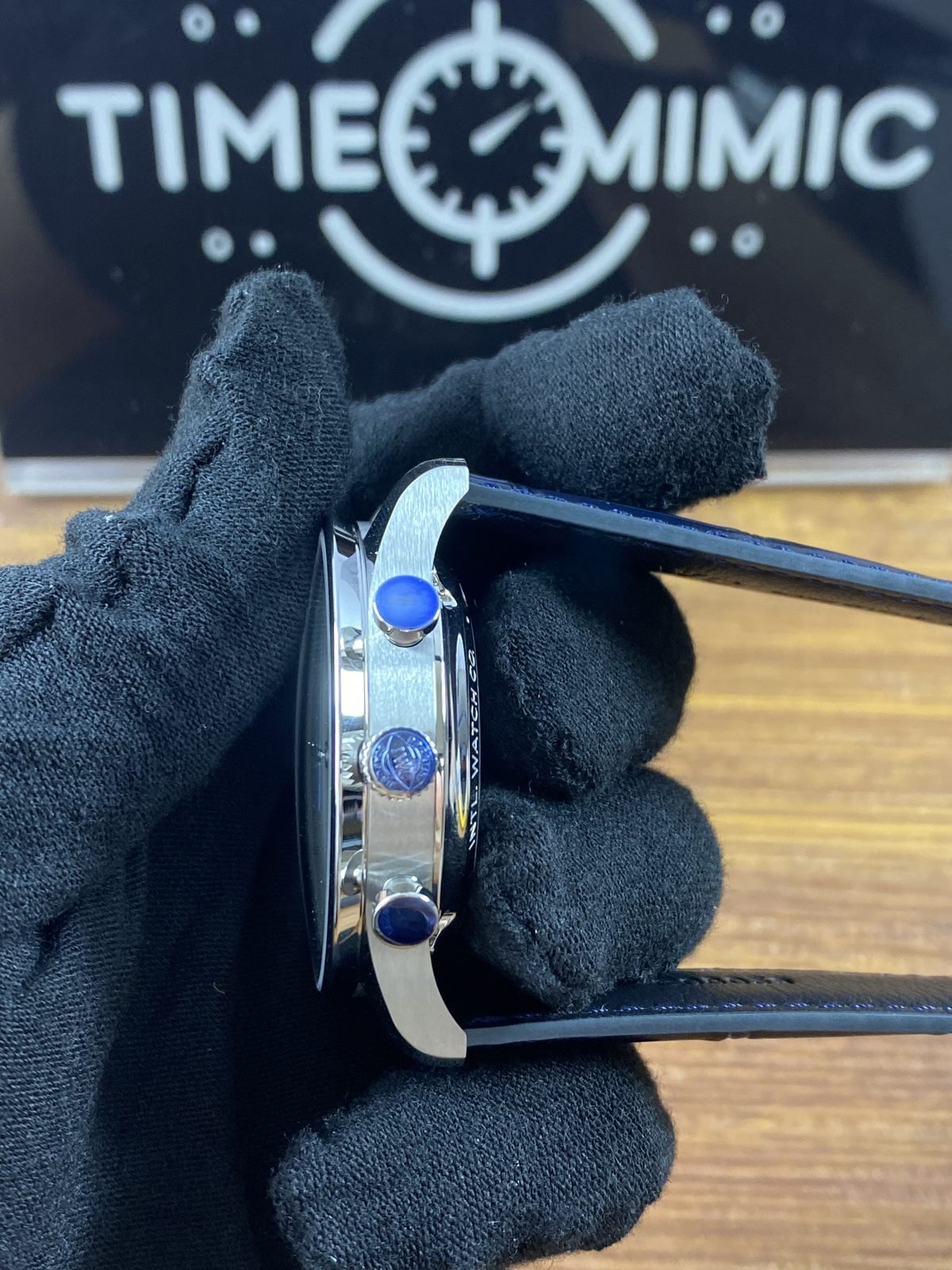 IWC Portugieser IW371446 replica steel colour case side crown two pushers blue protective films and dark blue strap