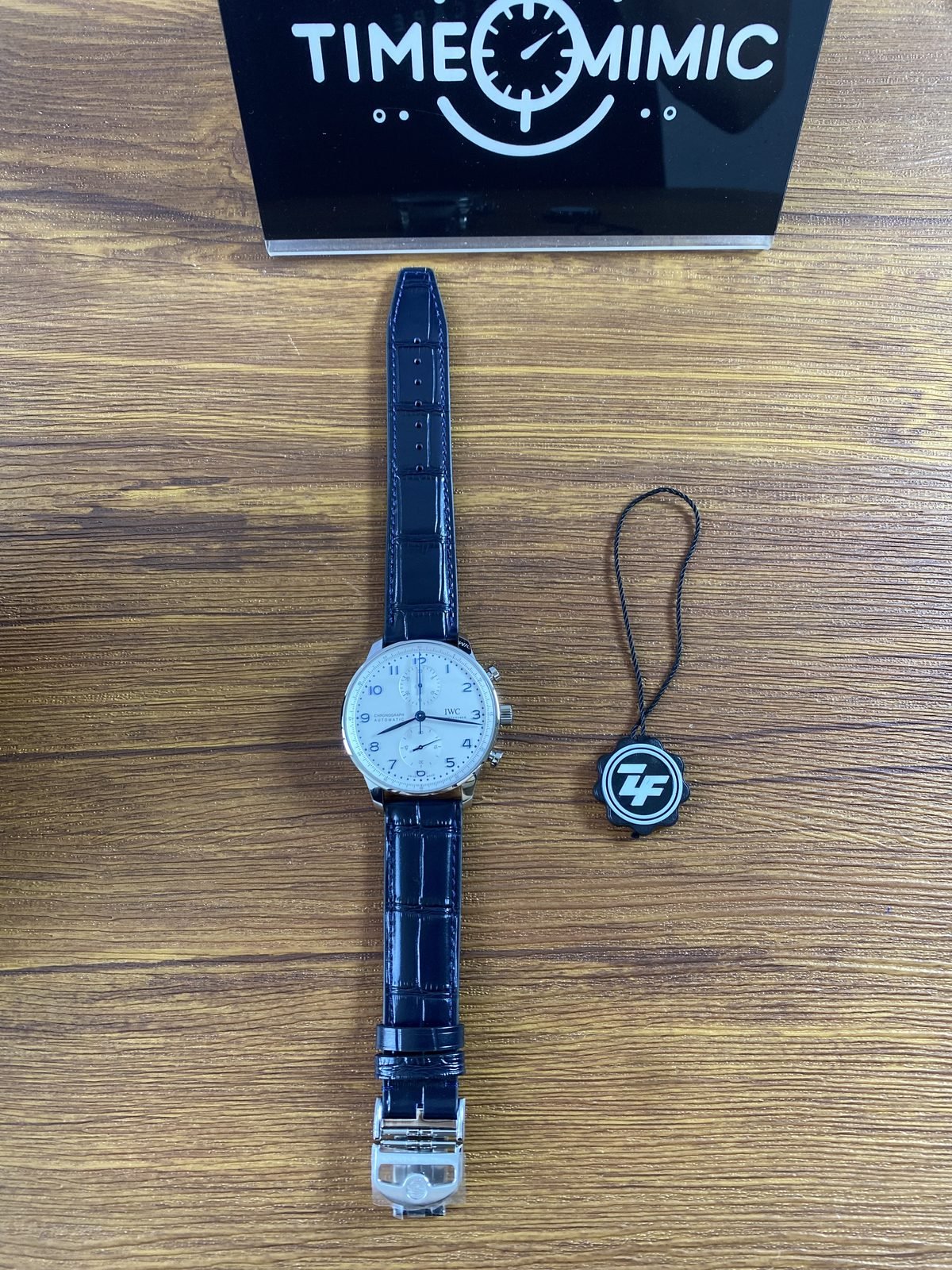 IWC Portugieser IW371446 replica full length sample beside removable ZF style hang tag