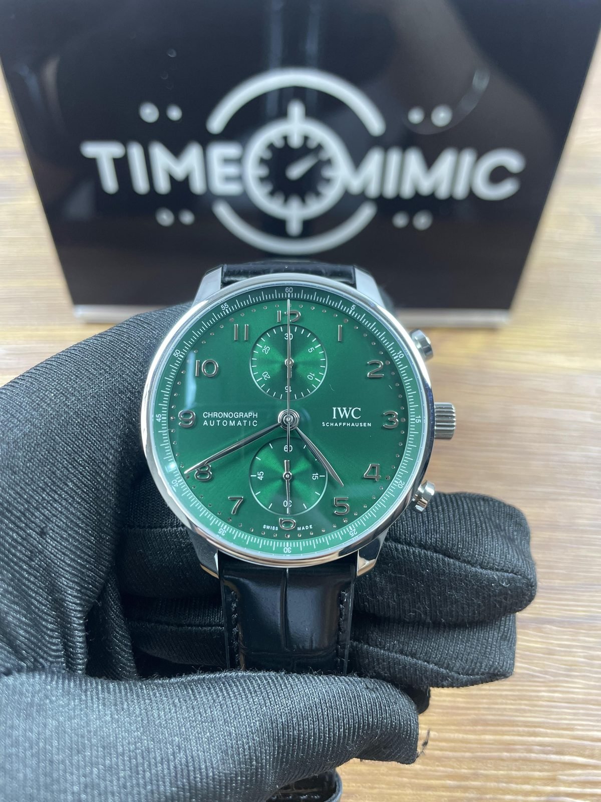 IWC Portugieser IW371615 replica green vertical two register dial steel colour case black strap front