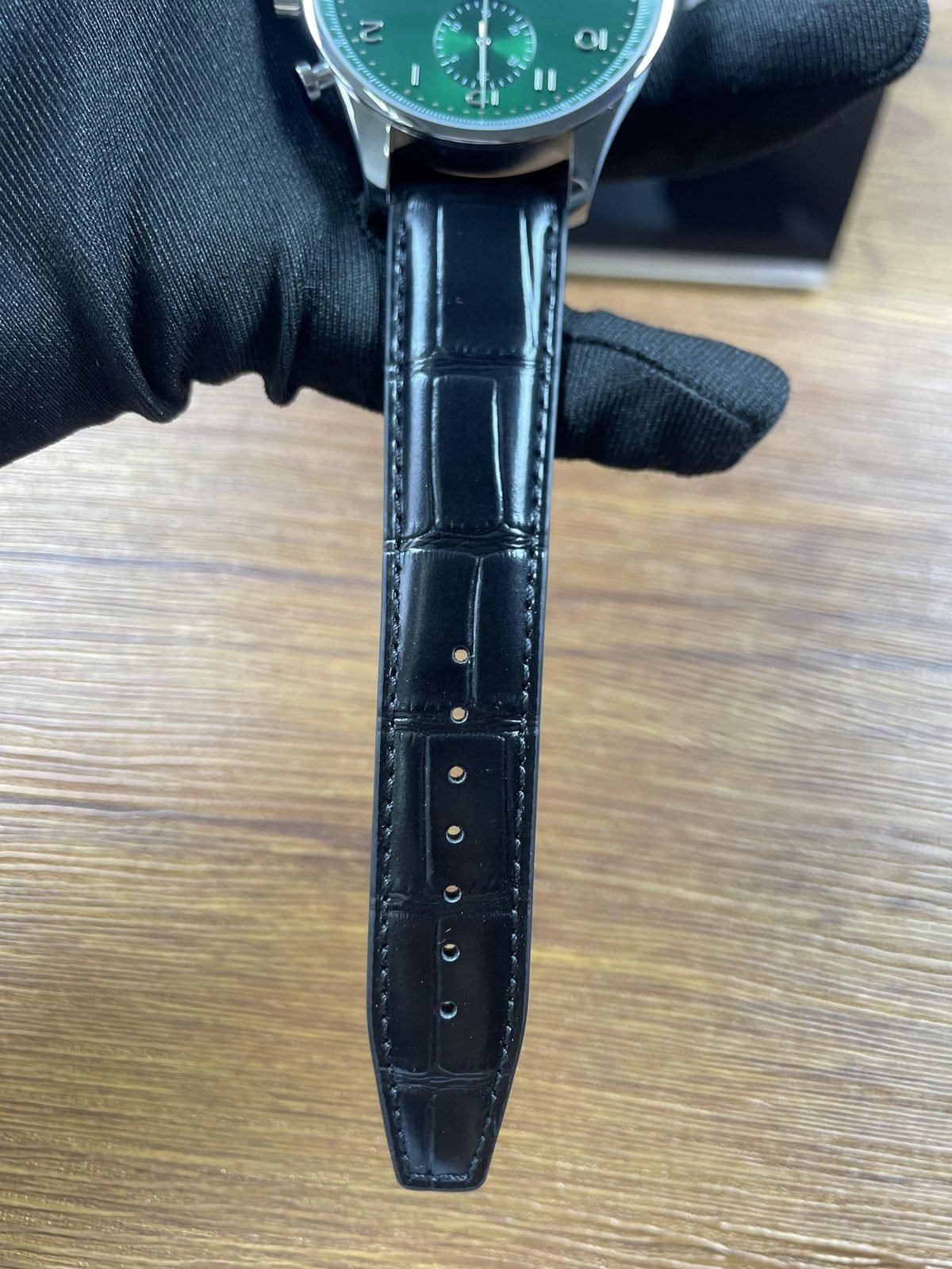 IWC Portugieser IW371615 replica fitted black glossy crocodile pattern strap close view
