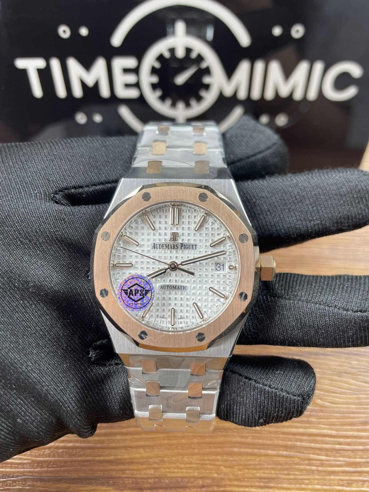 Royal Oak 15450SR replica front view with two-tone bracelet and silver white grid dial