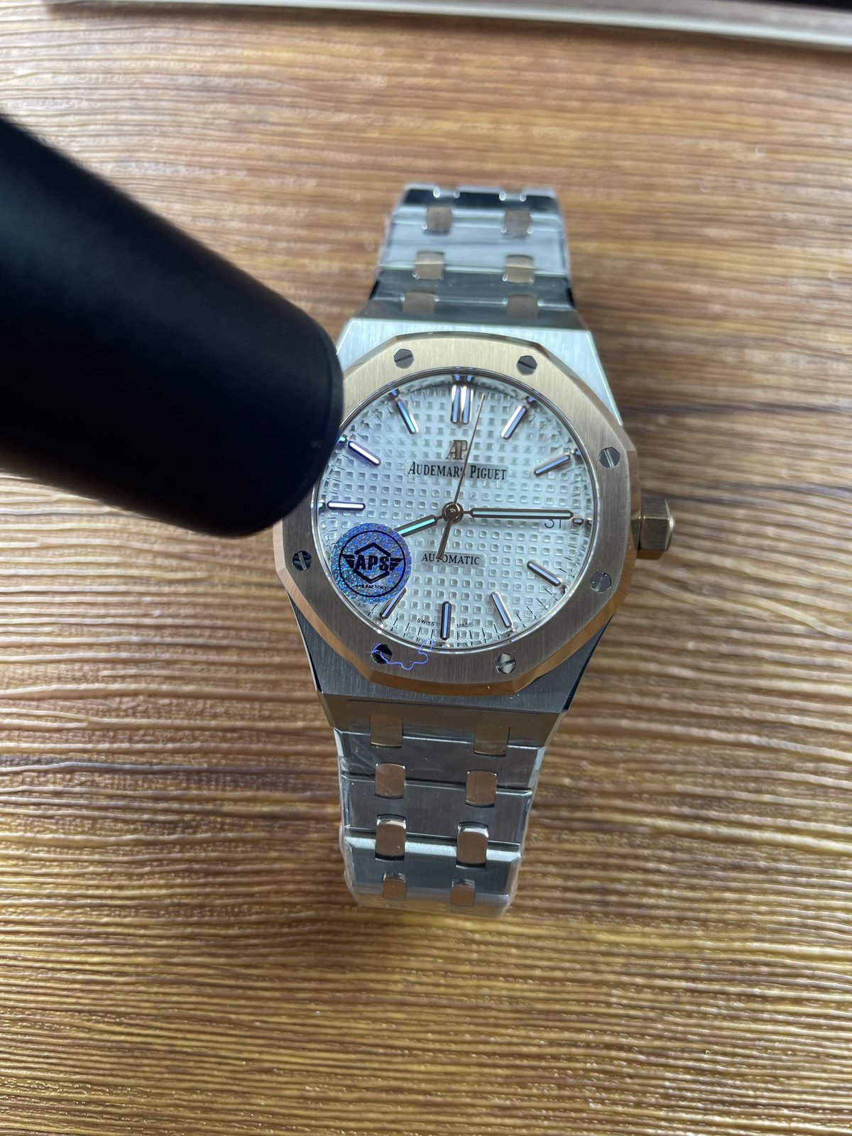 Royal Oak 15450SR replica dial under inspection light with temporary APSF sticker