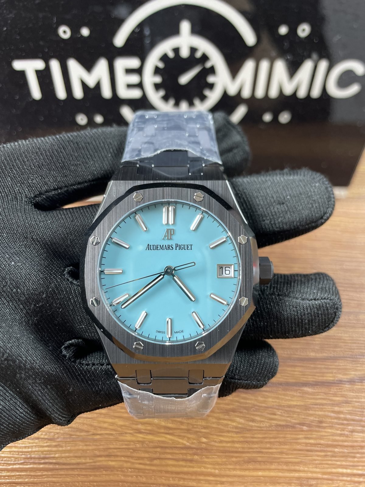 Royal Oak 15500 replica light-aqua smooth dial front view in dark gunmetal tone