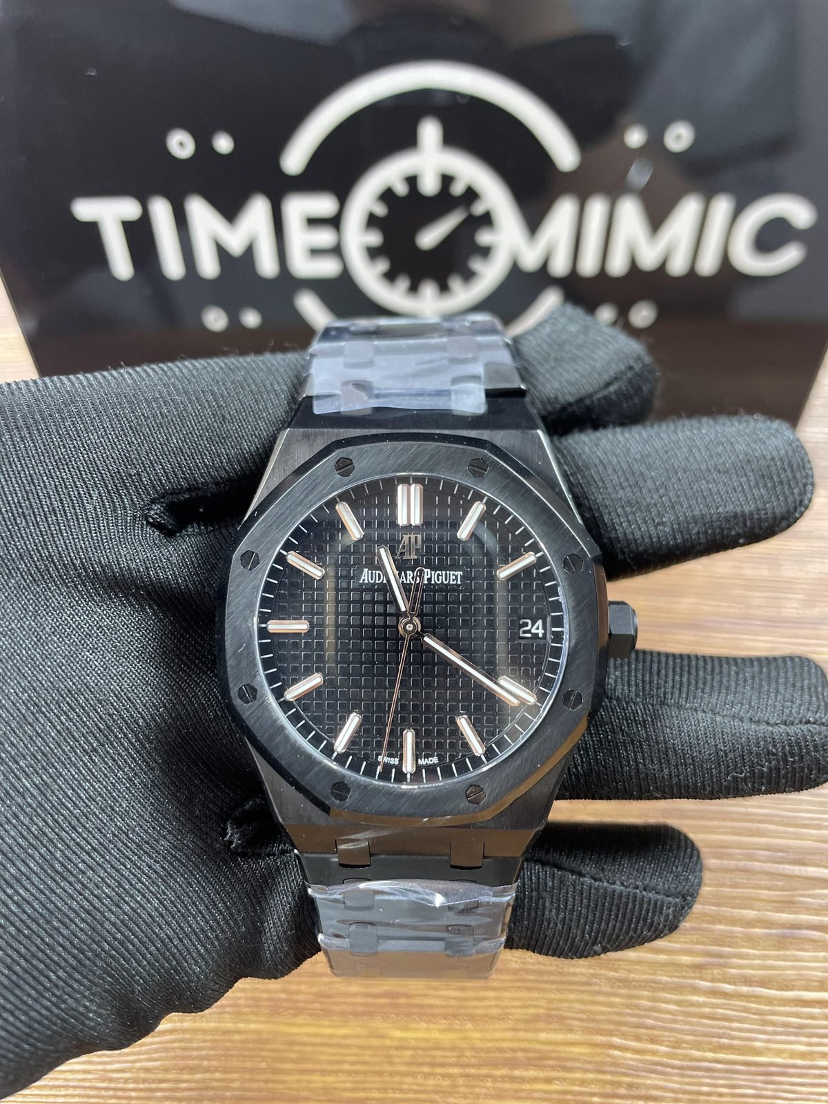 Royal Oak 15500 replica black grid dial front view with warm-tone markers
