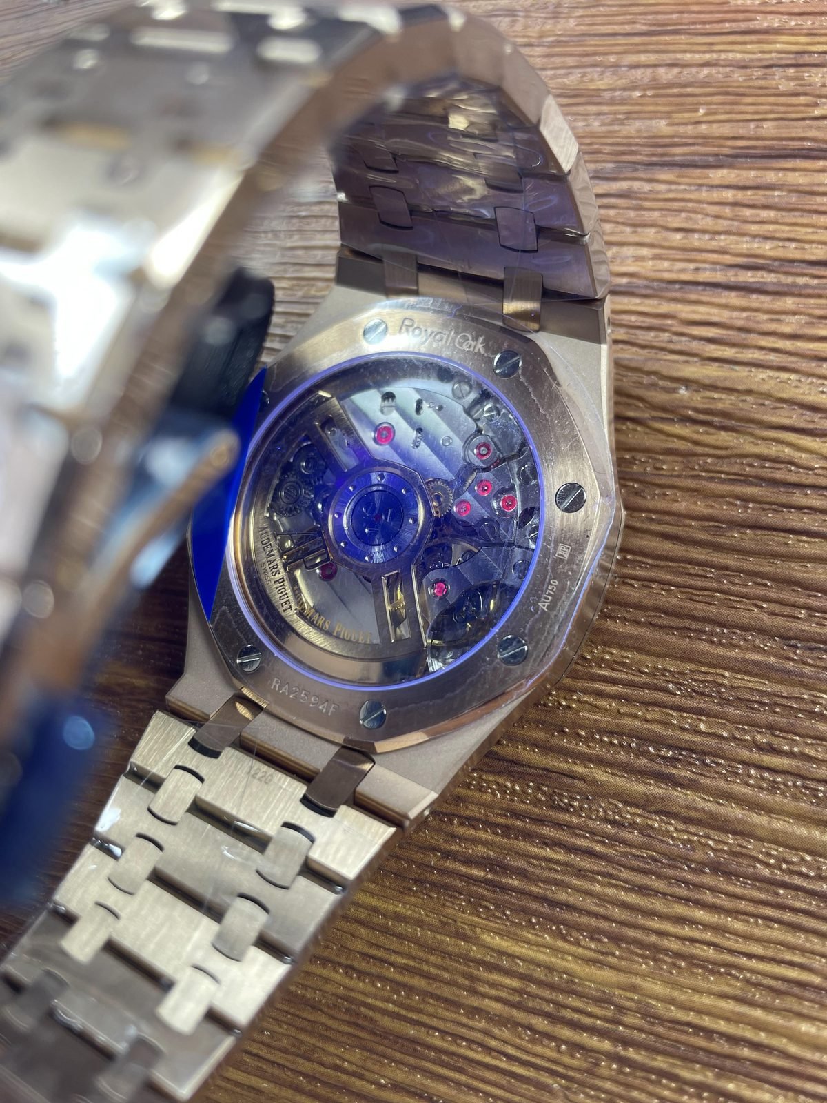 Royal Oak 15500OR replica exhibition caseback under blue inspection light