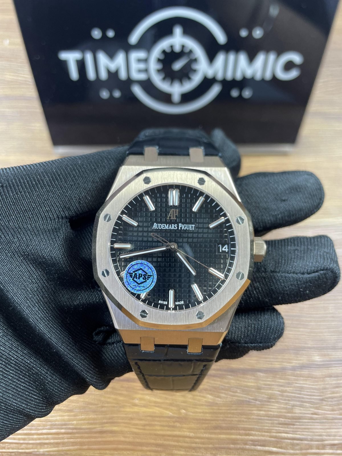 Royal Oak 15500OR D002CR replica black grid dial date at three and black strap front view