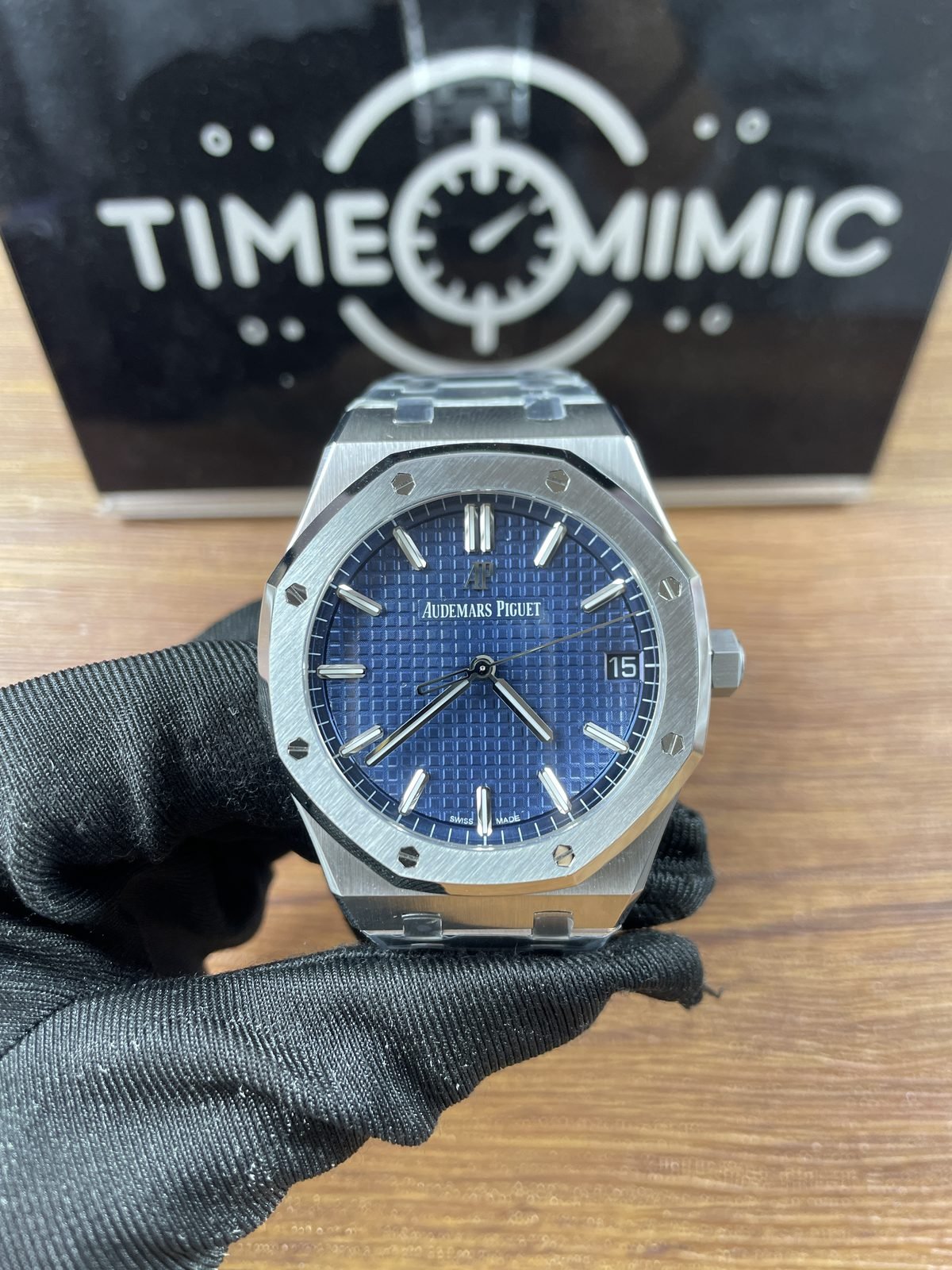 Royal Oak 15500ST replica blue grid dial steel-tone integrated bracelet straight-on QC view
