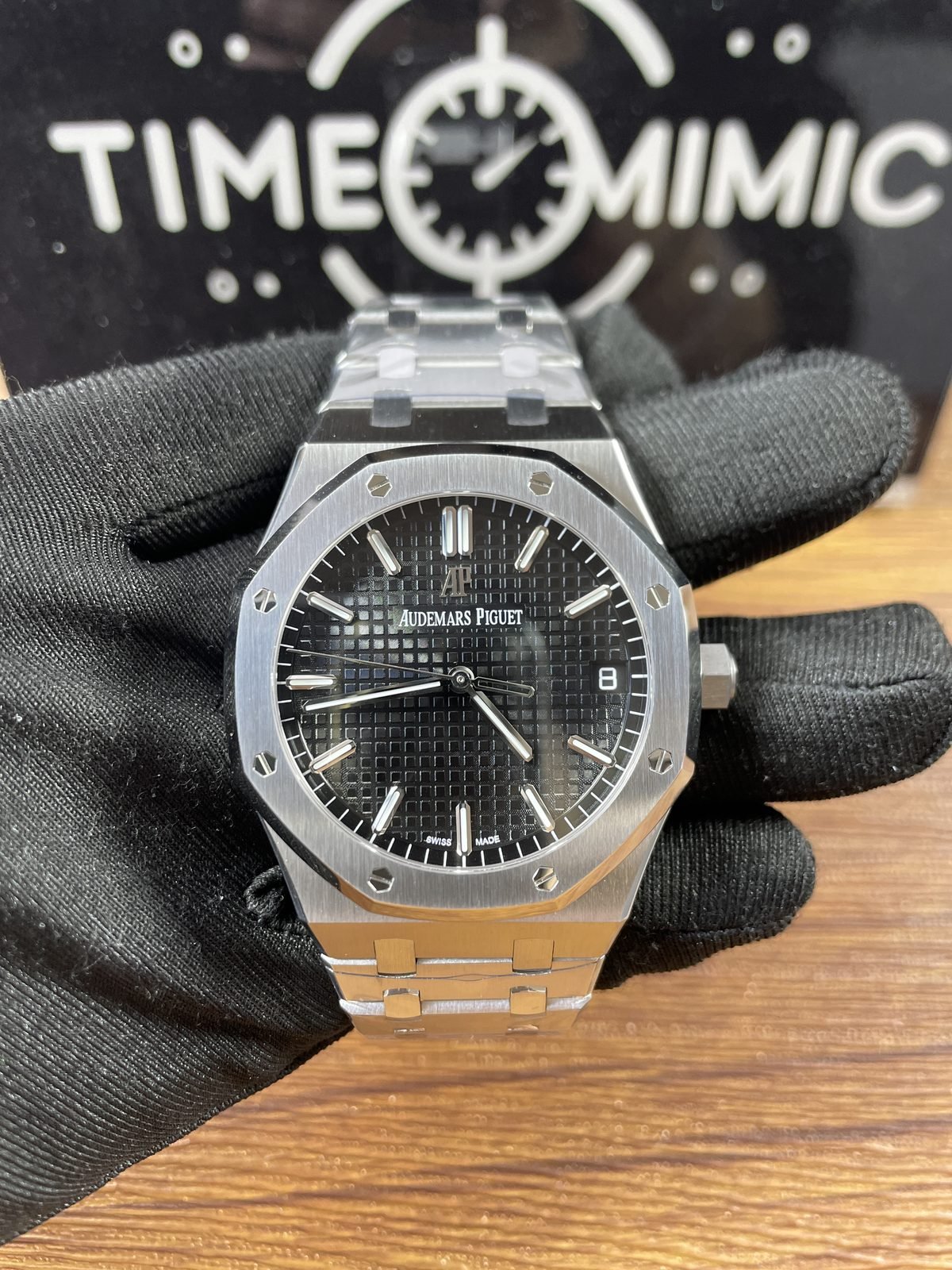 Royal Oak 15500ST 03 replica sample A black grid dial steel-tone integrated bracelet front QC view