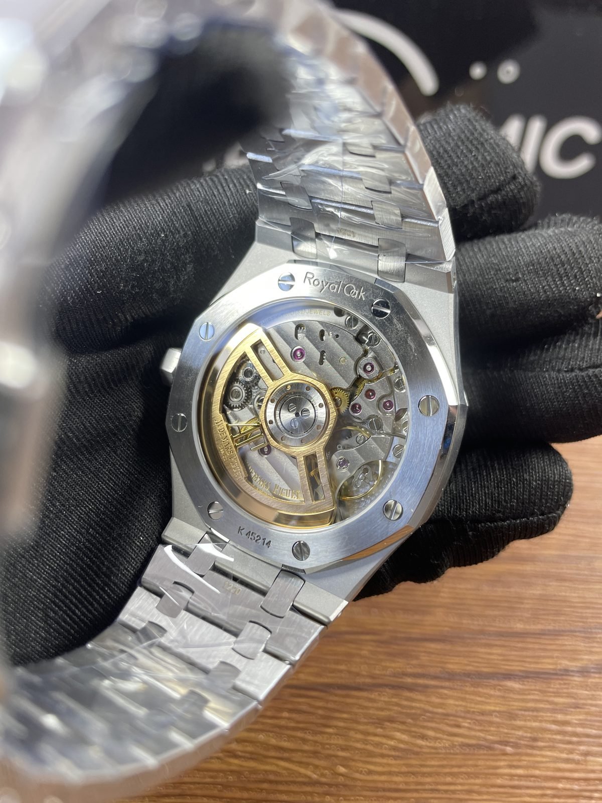 Royal Oak 15500ST 04 replica exhibition back decorated movement gold-tone openworked-style rotor and K45214-style marking