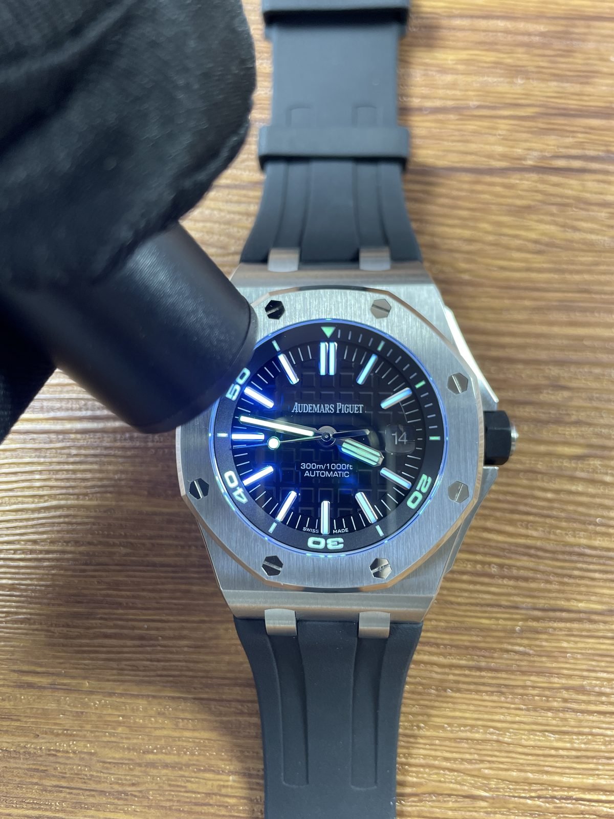 Royal Oak Offshore Diver 15710ST replica dial hands and markers under blue or ultraviolet-style light